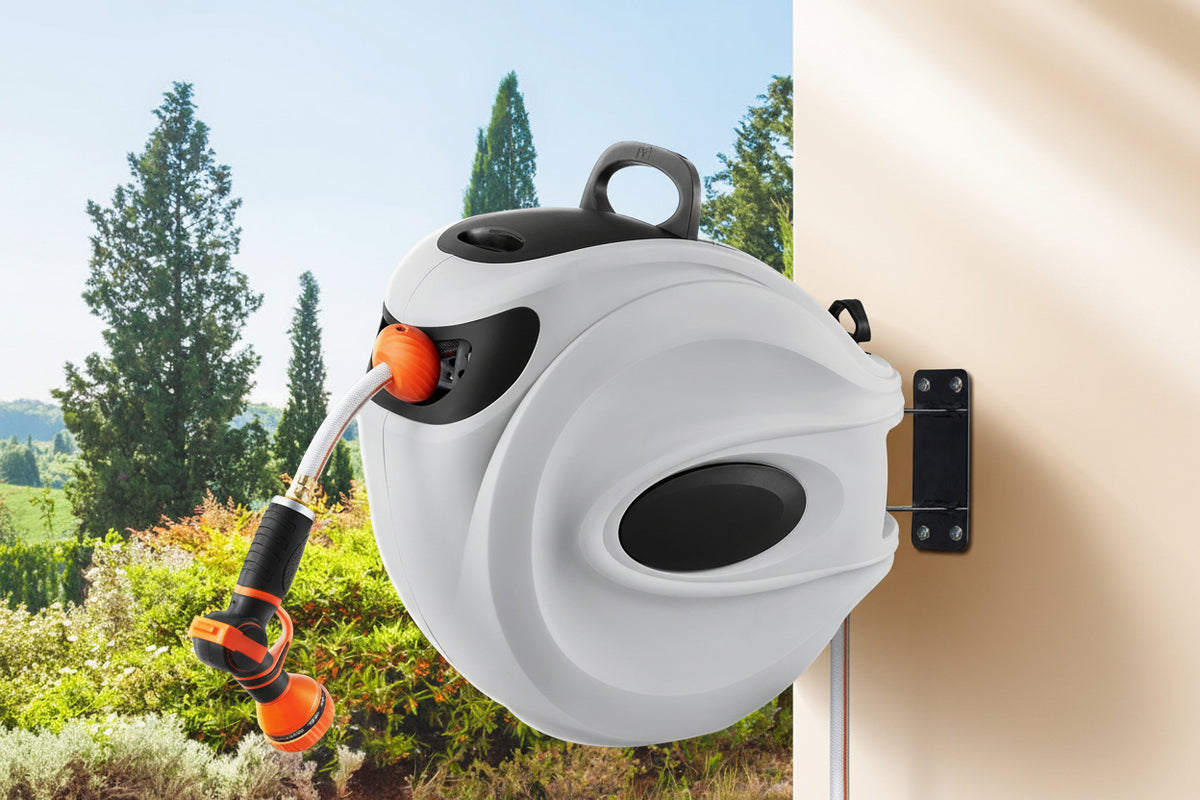 Retractable garden hose reel with Vevor branding on a wall outdoors.