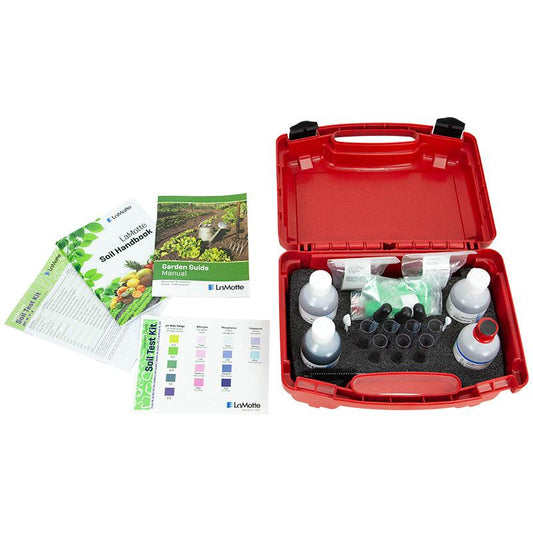 Red toolbox with soil testing kit components and manuals on a white background